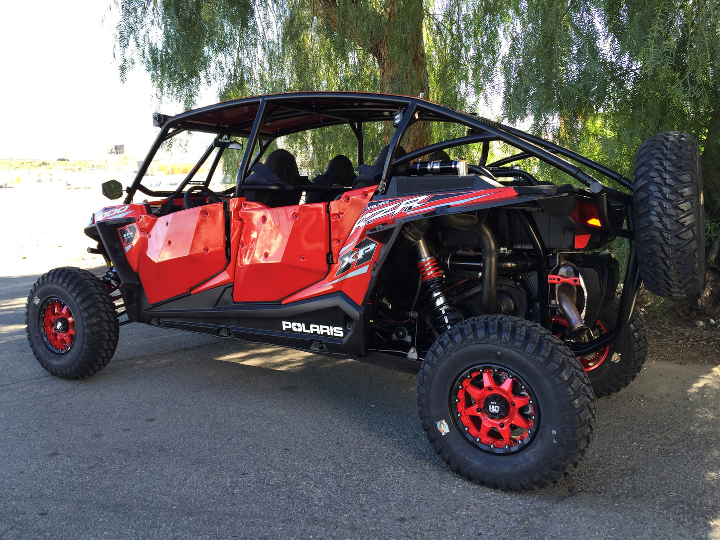 RAGING MOTORSPORTS RZR XP1000 4 Door in red
