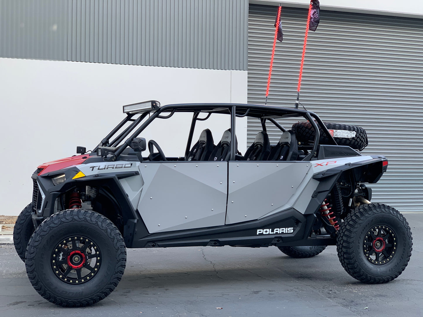 RAGING MOTORSPORTS RZR XP1000 4 Door in red